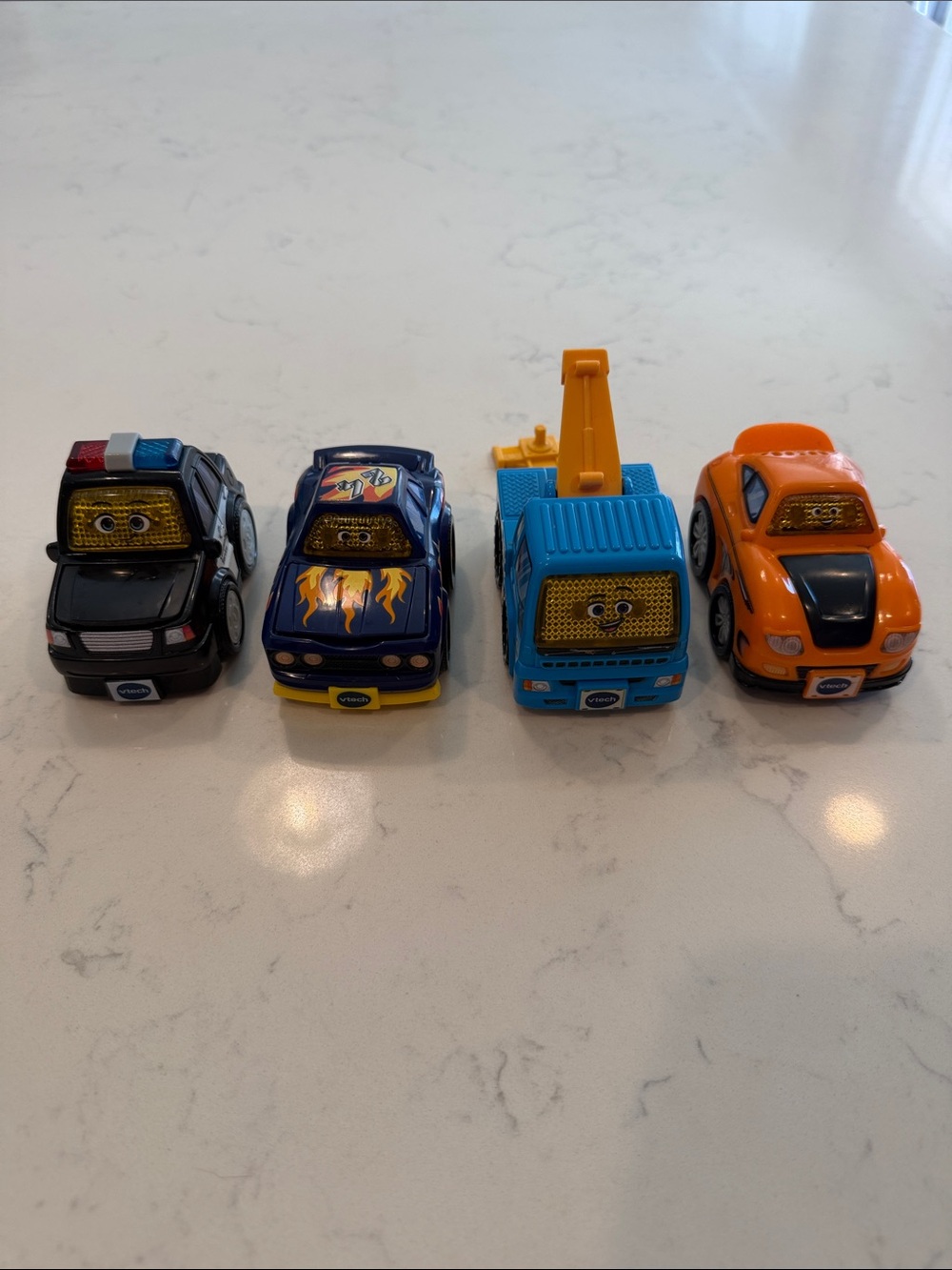 Vtech Kids Toy Car Set - police, race, and tow truck (gently used)